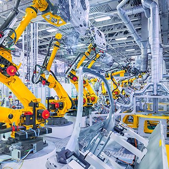 Robotic assembly line in an automotive plant