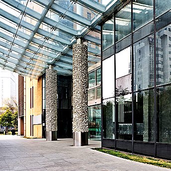 Glass canopy at a commercial building entrance